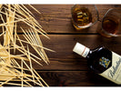 Flavored toothpicks with bottle and glasses of whiskey