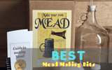 Mead making kit, mead in bottles and wine glass 