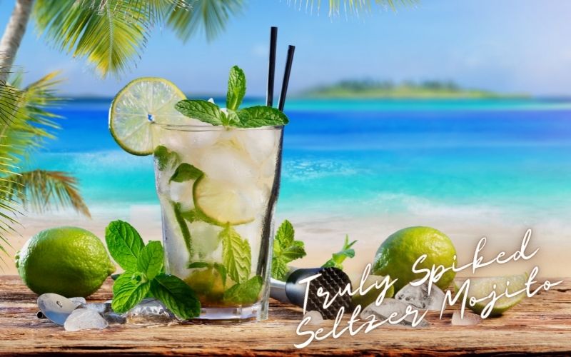 A glass of Truly Spiked Seltzer Mojito