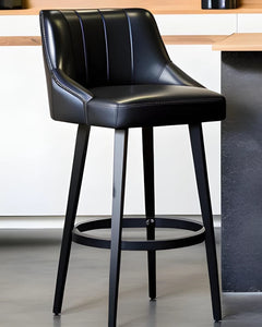 black leather bar stool with back in a home bar setting
