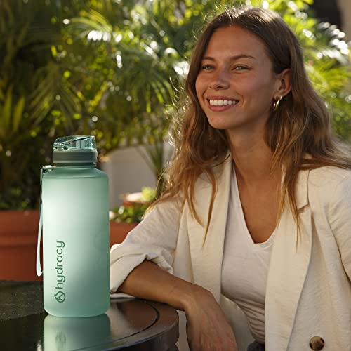https://advancedmixology.com/cdn/shop/files/hydracy-home-hydracy-water-bottle-with-time-marker-large-half-gallon-64oz-bpa-free-bottle-no-sweat-sleeve-leak-proof-gym-bottle-with-fruit-infuser-strainer-times-to-drink-ideal-gift-f_660f1bd1-965c-4b4e-8d06-23c512d09a24.jpg?v=1685327143