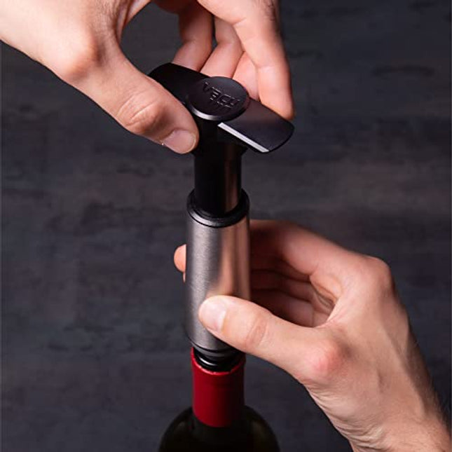 The Original Vacu Vin Wine Saver Pump and Wine Preserver with Vacu Vin Wine Stoppers Vacuum Sealers and Wine Pourers. Wine Pump is Stainless Steel. Wine Vacuum Stoppers are Black.