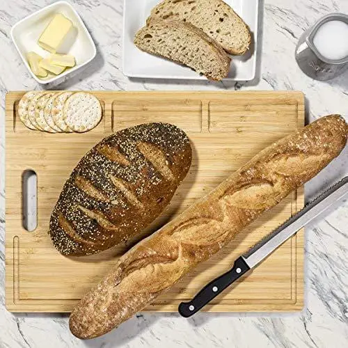 https://advancedmixology.com/cdn/shop/products/hhxrise-large-organic-bamboo-cutting-board-for-kitchen-with-3-built-in-compartments-and-juice-grooves-heavy-duty-chopping-board-for-meats-bread-fruits-butcher-block-carving-board-bpa_78fbb38e-c0f9-4767-9248-18f070b902dd.jpg?v=1644003848