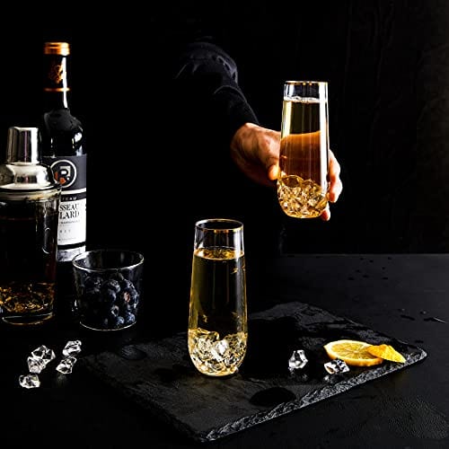 https://advancedmixology.com/cdn/shop/products/n9r-kitchen-n9r-12-pack-plastic-champagne-flutes-9-oz-stemless-disposable-gold-rim-toasting-glasses-crystal-clear-cocktail-cups-drinkware-shatterproof-ideal-for-party-wedding-birthday_769bb4a1-621e-4e32-abab-93bf6602c544.jpg?v=1644248288