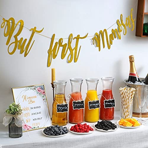 https://advancedmixology.com/cdn/shop/products/netany-kitchen-set-of-2-glass-carafe-with-lids-1-liter-water-pitcher-carafe-for-mimosa-bar-brunch-cold-water-beverage-wine-iced-tea-lemonade-2-wooden-chalkboard-tags-included-30496784_623b4c2a-6de5-48be-8845-e7dfa240a334.jpg?v=1676707483