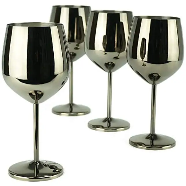 Vintage Brass Wine Goblets, Thailand Handmade Drinking Glasses Stemmed Tall  on white background. Stock Photo